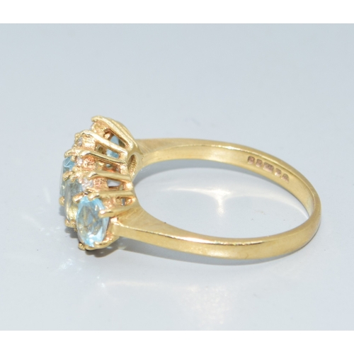 31 - 9ct gold vintage ladies 5 stone Aquamarine and clear accent gem stone ring in an open work setting s... 