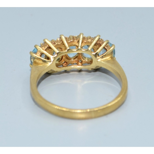 31 - 9ct gold vintage ladies 5 stone Aquamarine and clear accent gem stone ring in an open work setting s... 