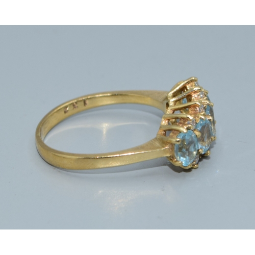 31 - 9ct gold vintage ladies 5 stone Aquamarine and clear accent gem stone ring in an open work setting s... 