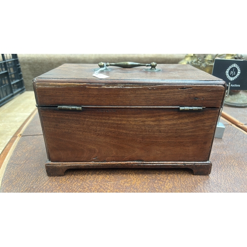 12 - Rectangular mahogany single-lid tea caddy with brass swing carrying handle, pierced escutcheon and b... 