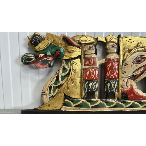 57 - Hand-carved and polychrome gilt wood relief panel from Ubud, Bali, portraying a ceremonial processio... 
