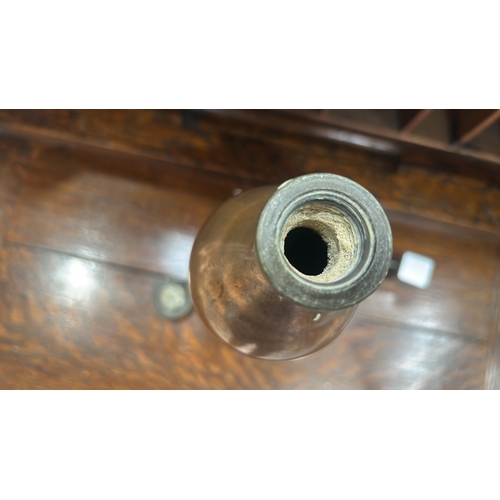 65 - Hand-made cylindrical brass bottle, rounded shoulders, threaded neck and screw cap, interior unlined... 