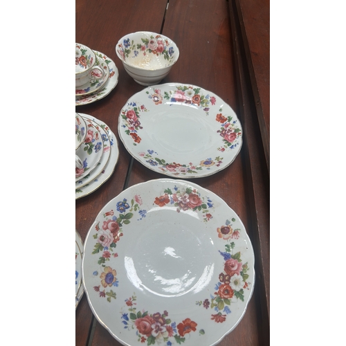 17 - Grosvenor China “ye Old English” bone china tea cups and serving plates.