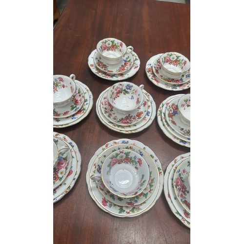 17 - Grosvenor China “ye Old English” bone china tea cups and serving plates.