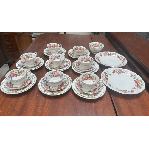 17 - Grosvenor China “ye Old English” bone china tea cups and serving plates.
