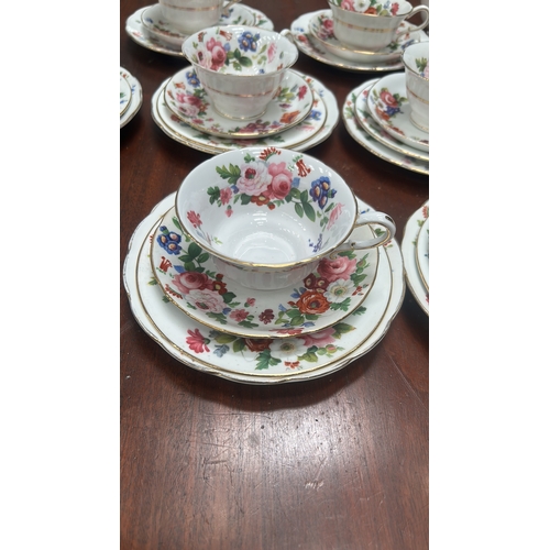 17 - Grosvenor China “ye Old English” bone china tea cups and serving plates.