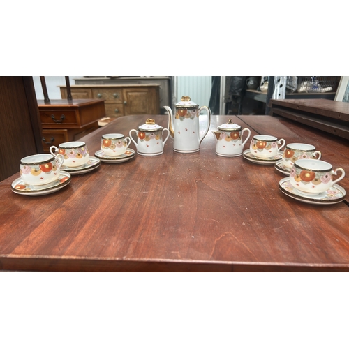 19 - Early 20th-century Kutani-style porcelain coffee service, hand-enameled with gilt chrysanthemum band... 