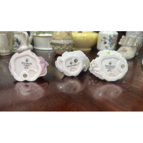 20 - Group of approx. eighteen miniature and small decorative porcelain items, comprising Royal Doulton “... 