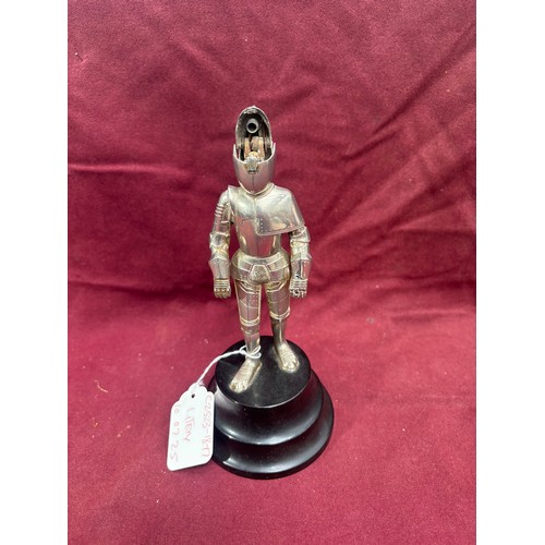 26 - A Vintage mid Twentieth Century knight in armour table lighter and musical box.20.5cm