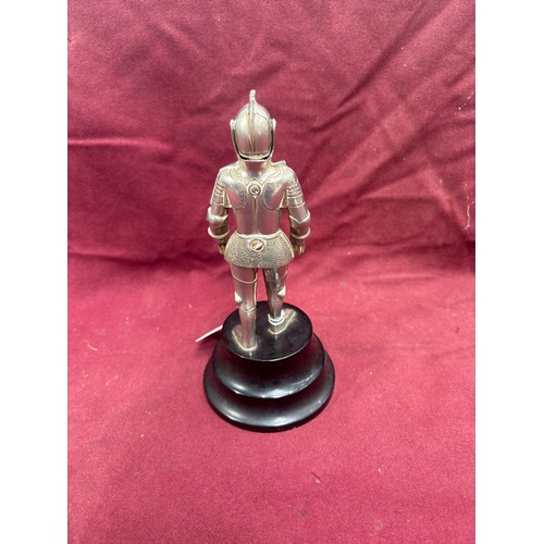 26 - A Vintage mid Twentieth Century knight in armour table lighter and musical box.20.5cm