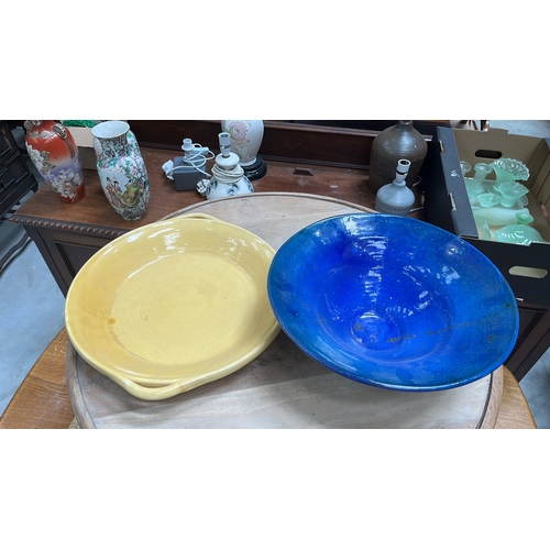 41 - Pair of contemporary hand-thrown glazed ceramic bowls comprising a shallow ochre earthenware dish wi... 