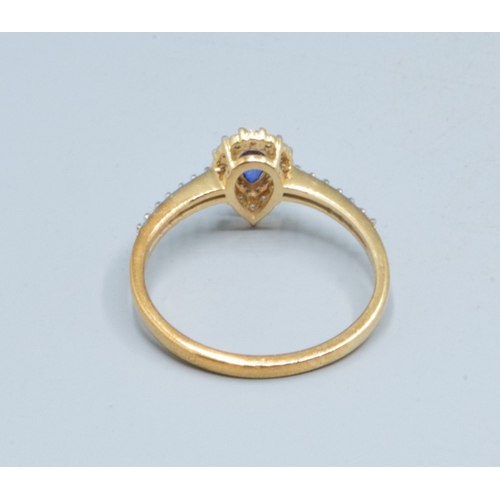 15 - 9ct gold ladies Pear shape Sapphire dress ring with clear stone decoration size R, 2.2grams