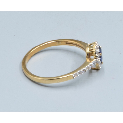 15 - 9ct gold ladies Pear shape Sapphire dress ring with clear stone decoration size R, 2.2grams
