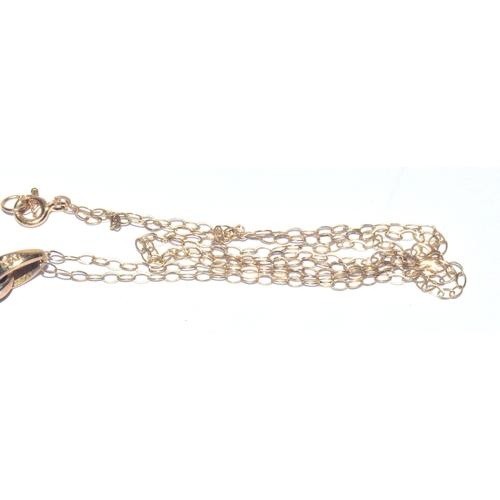 24 - 9ct gold Diamond and red gem stone pendant necklace on a 9ct gold chain of 40cm