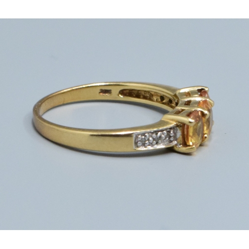 28 - 9ct gold ladies Citrine 3 stone and Diamond ring size N, 2.6grams