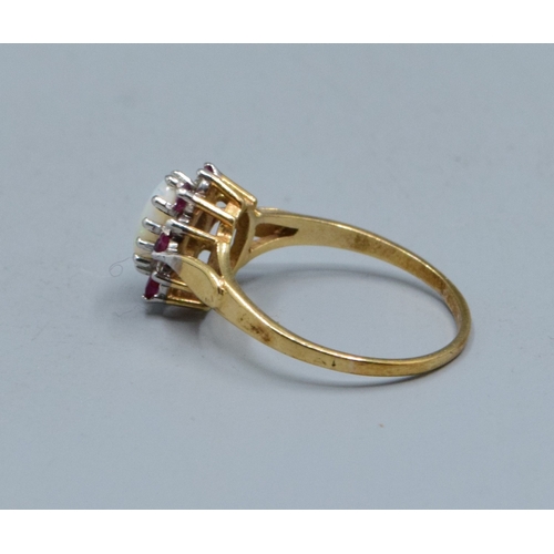 30 - 9ct gold ladies vintage Opal and garnet with Diamond decoration cluster ring the head being 10mm dia... 