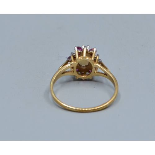 30 - 9ct gold ladies vintage Opal and garnet with Diamond decoration cluster ring the head being 10mm dia... 