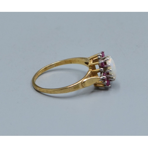 30 - 9ct gold ladies vintage Opal and garnet with Diamond decoration cluster ring the head being 10mm dia... 
