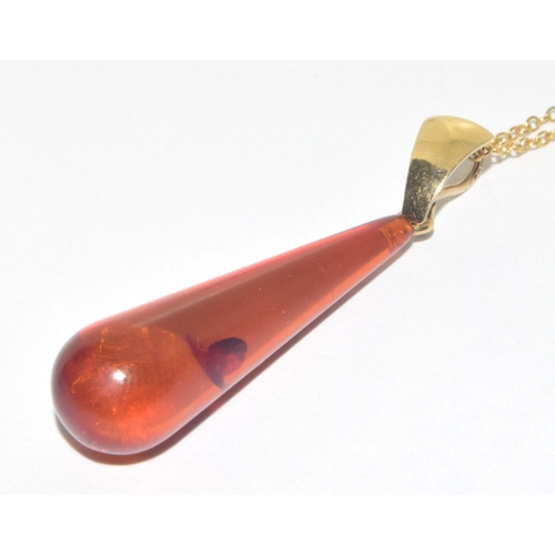 47 - 9ct gold Amber pendant necklace on a 9ct gold chain of