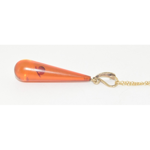 47 - 9ct gold Amber pendant necklace on a 9ct gold chain of