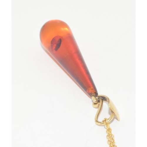 47 - 9ct gold Amber pendant necklace on a 9ct gold chain of