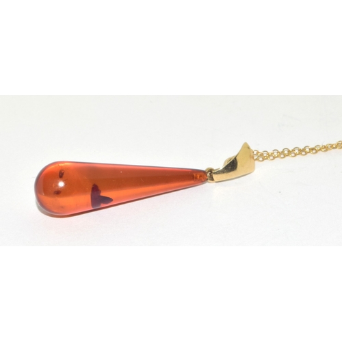 47 - 9ct gold Amber pendant necklace on a 9ct gold chain of