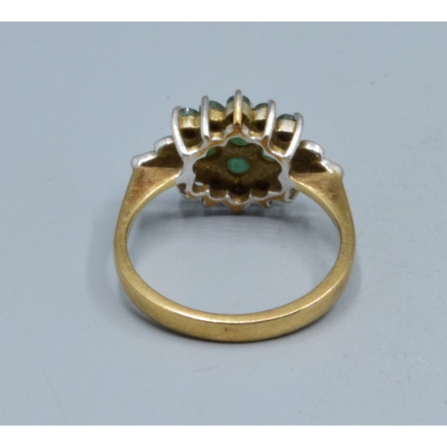 53 - 9ct gold ladies vintage Emerald cluster ring with clear gem stone decoration the head being 16x10mm ... 