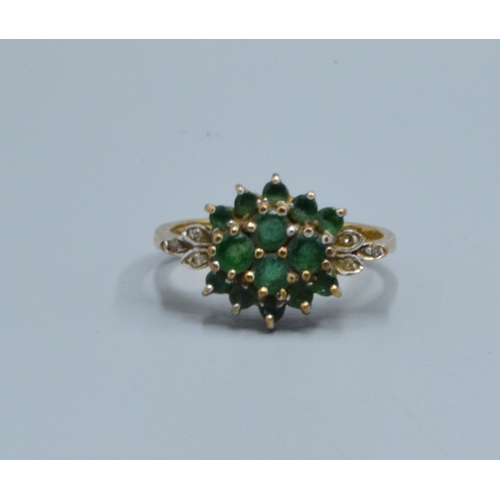 53 - 9ct gold ladies vintage Emerald cluster ring with clear gem stone decoration the head being 16x10mm ... 