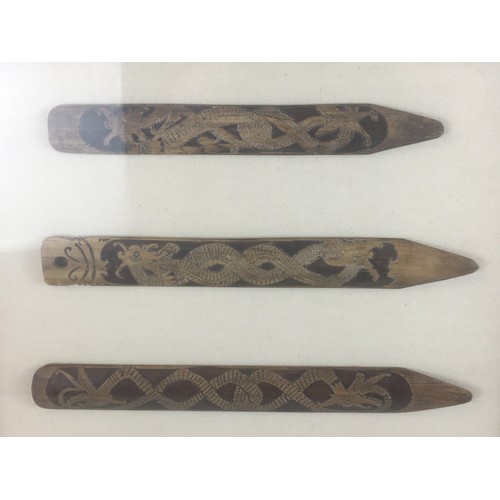 294 - Bornean Mounted trio of Carved Wood Hair Sticks Carved with Dragons. Framed and Glazed. Early 20th C... 