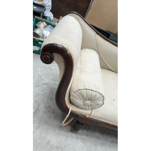 303 - a very elegant early 19th-century Regency mahogany Grecian chaise longue, scrolled ends with carved ... 