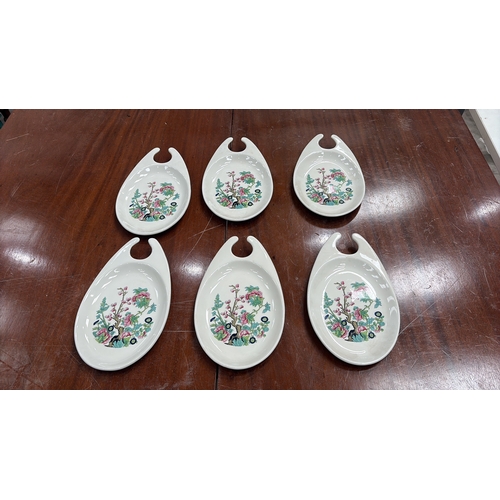 314 - Set of 6 Maddock Hotelware white ceramic hook-handled side dishes, transfer printed with stylised or... 