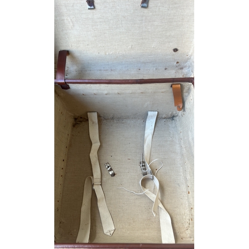 335 - Rectangular tan leather suitcase with stitched edges, riveted corner protectors, twin brass locks, a... 