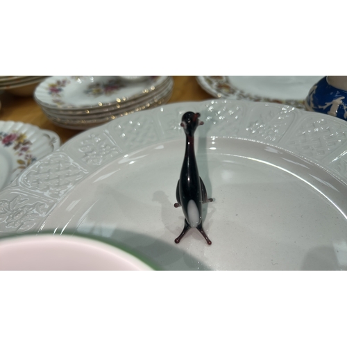 100 - Group of assorted English bone china cups, saucers and side plates by Royal Stafford and Portmeirion... 