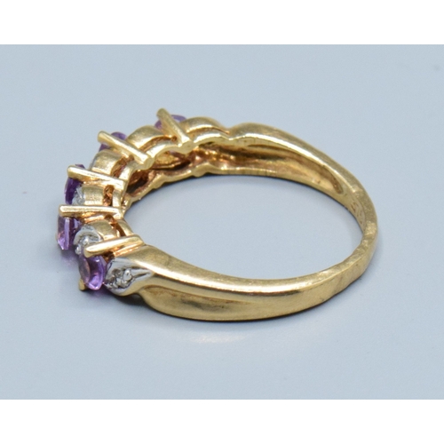 36 - 9ct gold ladies vintage Amethyst and Diamond wave half eternity ring hall marked as Diamond size L, ... 