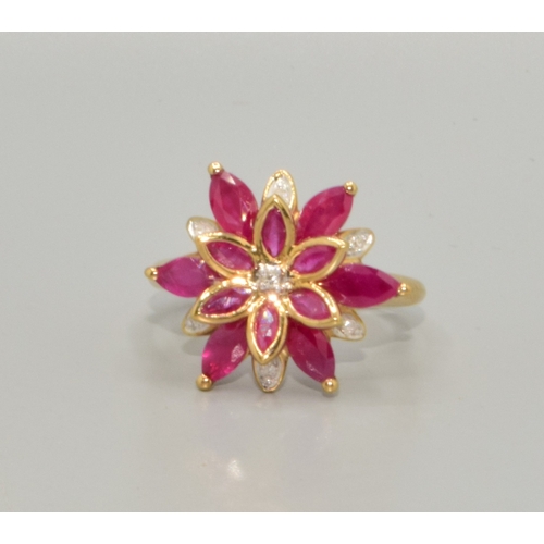 40 - Large Diamond and Ruby ladies fancy statement ring in the shape of a star burst in 9ct gold size P, ... 