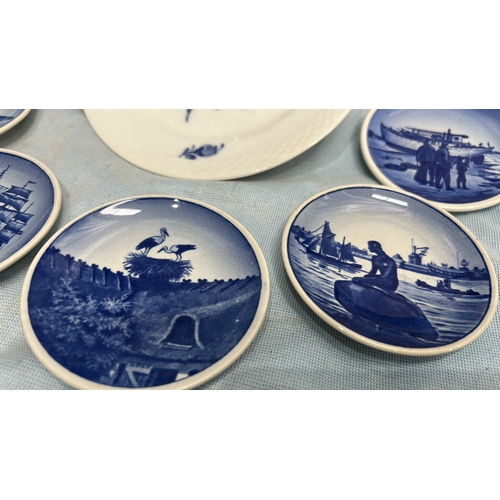 212 - Set of 7 Royal Copenhagen blue-and-white plates, comprising a 'Blue Flower Braided' soup plate (shap... 