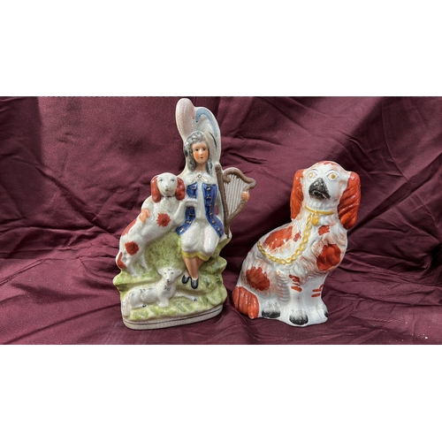 373 - Pair of Victorian Staffordshire pottery figures comprising a flat-back group of a maiden with harp a... 