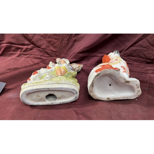 373 - Pair of Victorian Staffordshire pottery figures comprising a flat-back group of a maiden with harp a... 