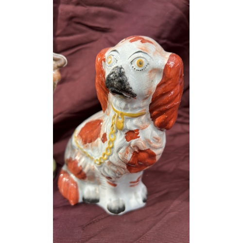 373 - Pair of Victorian Staffordshire pottery figures comprising a flat-back group of a maiden with harp a... 