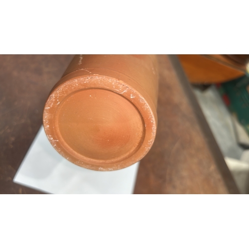 413 - Terracotta handled ewer with domed knop lid, incised vertical fluting to neck and geometric band to ... 