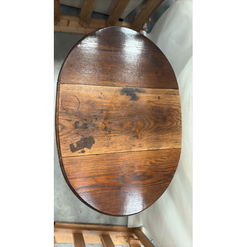 42 - Early 20th-century oak occasional table, oval drop-leaf top on spiral-turned legs united by box stre... 