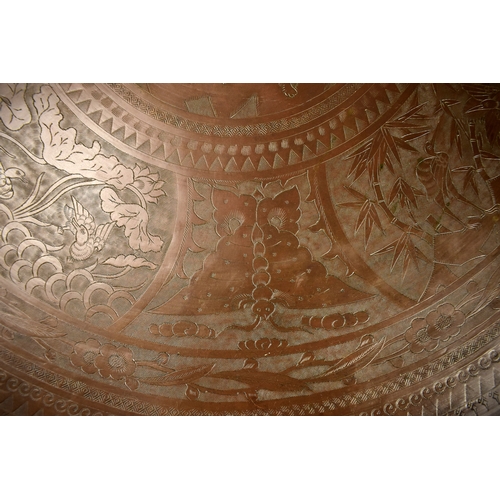 464 - A large Chinese bronzed brass engraved Benares top / tray.Engraved with various animals and flora. l... 