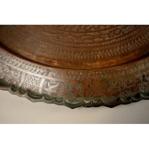 464 - A large Chinese bronzed brass engraved Benares top / tray.Engraved with various animals and flora. l... 