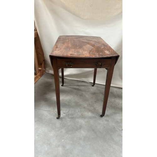 21 - Mahogany Pembroke table, the rectangular top with rounded drop leaves forming an oval, single frieze... 