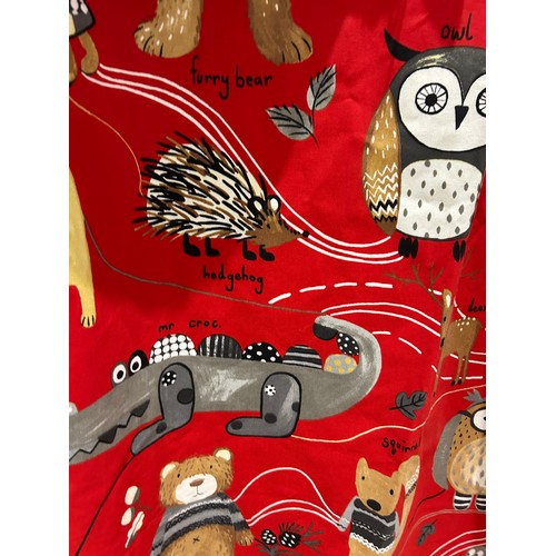 170 - Pair of children’s curtains in Prestigious Textiles “Nature Trail” cotton, red ground printed with w... 