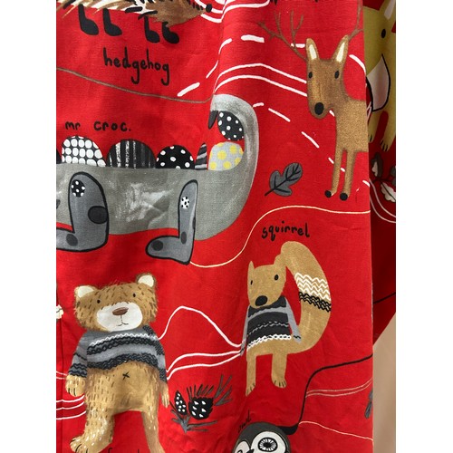 170 - Pair of children’s curtains in Prestigious Textiles “Nature Trail” cotton, red ground printed with w... 