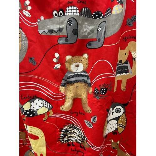 170 - Pair of children’s curtains in Prestigious Textiles “Nature Trail” cotton, red ground printed with w... 
