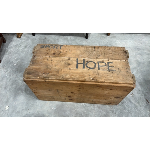 175 - Rectangular pine plank chest with removable top, stencilled “SPORT HOPE” across the lid, rope handle... 