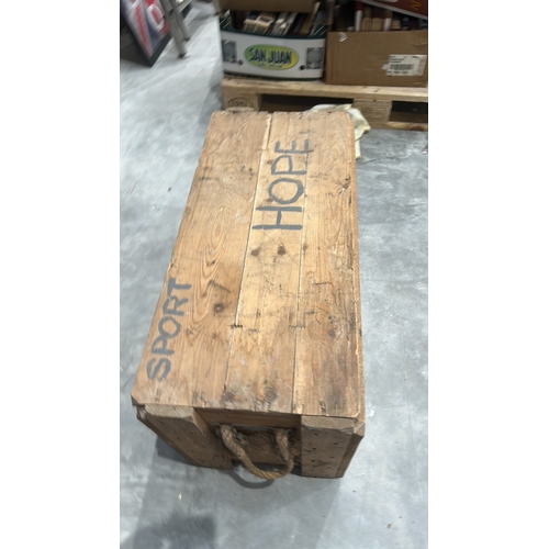 175 - Rectangular pine plank chest with removable top, stencilled “SPORT HOPE” across the lid, rope handle... 
