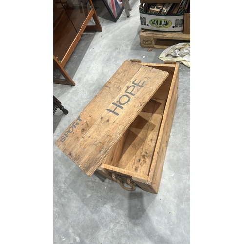 175 - Rectangular pine plank chest with removable top, stencilled “SPORT HOPE” across the lid, rope handle... 